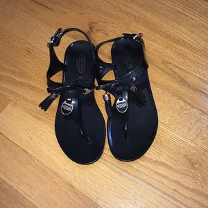 Coach black sandals.